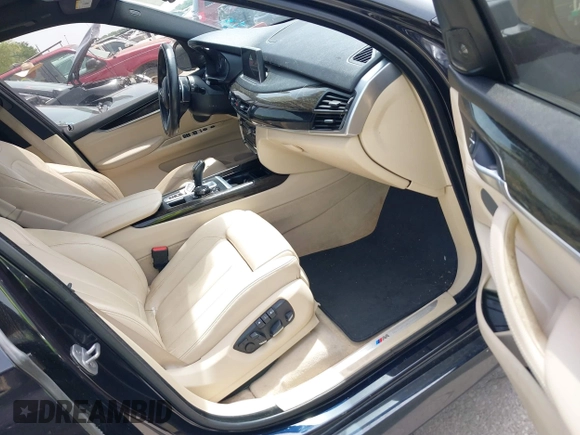 2014 BMW X5 xDrive50i with VIN 5UXKR6C55E0C03743, listed as a IAAI auction lot 42268302 with 118,892 mi miles and . Bid and sale history available at DreamBid. Image 5.