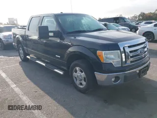 2011 Ford F-150 XLT with VIN 1FTFW1CT3BFA62528, listed as a IAAI auction lot 41920965 with 128,799 mi miles. Bid and sale history available at carsss.com. Image 1.