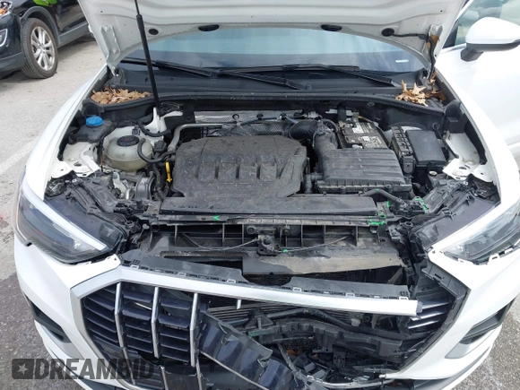 2021 Audi Q3 Premium with VIN WA1AUCF33M1096437, listed as a IAAI auction lot 41910411 with 86,837 mi miles and . Bid and sale history available at DreamBid. Image 10.