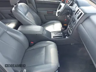 2005 Chrysler 300 with VIN 2C3AA53G35H157083, listed as a IAAI auction lot 41945392 with 192,215 mi miles. Bid and sale history available at carsss.com. Image 5.