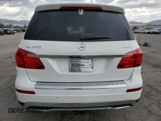 2014 Mercedes-Benz GL 450 z VIN 4JGDF7CE4EA314084, wystawiony jako Copart lot #59593195 z przebiegiem 161 026 mil mil oraz Szkoda całkowita • Salvage title. Historia ofert i sprzedaży dostępna na DreamBid. Obrazek 6.