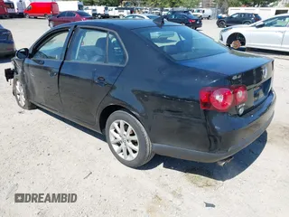 2010 Volkswagen Jetta Sedan Limited with VIN 3VWRZ7AJ5AM158388, listed as a IAAI auction lot 42054349 with 101,272 mi miles. Bid and sale history available at carsss.com. Image 3.