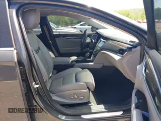 2013 Cadillac XTS Luxury z VIN 2G61R5S33D9101434, wystawiony jako IAAI lot #42290199 z przebiegiem 48 075 mil mil oraz . Historia ofert i sprzedaży dostępna na DreamBid. Obrazek 5.