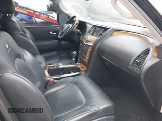 2011 Infiniti QX56 7-passenger z VIN JN8AZ2NF6B9500900, wystawiony jako IAAI lot #41585262 z przebiegiem 201 958 mil mil oraz . Historia ofert i sprzedaży dostępna na DreamBid. Obrazek 5.