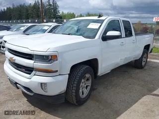 2017 Chevrolet Silverado 1500 LT with VIN 1GCVKREC7HZ131196, listed as a IAAI auction lot 42072336 with 158,140 mi miles. Bid and sale history available at carsss.com. Image 18.