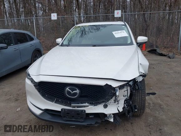 2020 Mazda CX-5 Touring with VIN JM3KFBCM5L1737640, listed as a IAAI auction lot 41613576 with 1 mi miles. Bid and sale history available at carsss.com. Image 6.