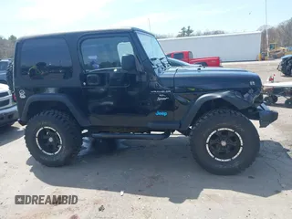2005 Jeep Wrangler X z VIN 1J4FA39S45P382880, wystawiony jako IAAI lot #42129610 z przebiegiem 191 864 mil mil oraz . Historia ofert i sprzedaży dostępna na DreamBid. Obrazek 13.