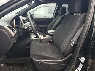 2017 Jeep Grand Cherokee Laredo with VIN 1C4RJFAG2HC754157, listed as a Copart auction lot 55650095 with 60,767 mi miles and Salvage title. Bid and sale history available at DreamBid. Image 7.