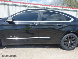2014 Chevrolet Impala LTZ with VIN 1G1155S34EU145366, listed as a IAAI auction lot 41880712 with 171,000 mi miles. Bid and sale history available at carsss.com. Image 14.
