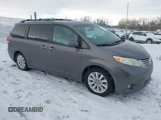2011 Toyota Sienna XLE AAS with VIN 5TDYK3DC5BS138281, listed as a IAAI auction lot 41381494 with 194,635 mi miles. Bid and sale history available at carsss.com. Image 1.