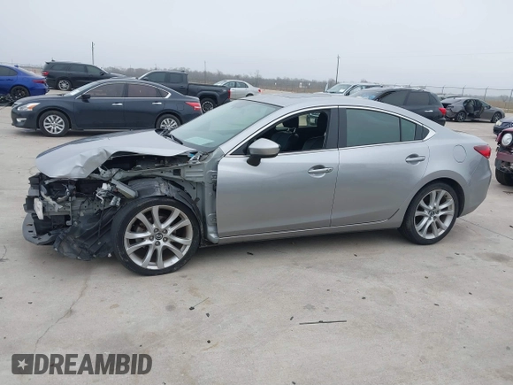 2015 Mazda 6 i Touring with VIN JM1GJ1V56F1209476, listed as a IAAI auction lot 41644215 with 112,255 mi miles. Bid and sale history available at carsss.com. Image 14.