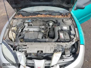 2003 Pontiac Sunfire with VIN 1G2JB12F237312035, listed as a IAAI auction lot 41727230 with 165,534 mi miles. Bid and sale history available at carsss.com. Image 10.