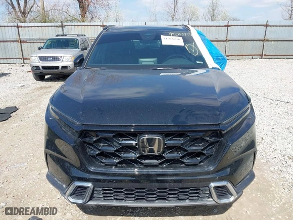 2023 Honda CR-V Hybrid Sport Touring with VIN 5J6RS6H9XPL005264, listed as a IAAI auction lot 41928236 with 19,384 mi miles. Bid and sale history available at carsss.com. Image 13.