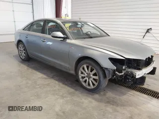 2013 Audi A6 3.0T Premium Plus with VIN WAUGGAFC3DN066310, listed as a IAAI auction lot 42020702 with 195,939 mi miles. Bid and sale history available at carsss.com. Image 1.