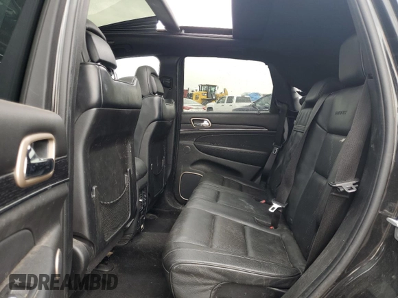 2015 Jeep Grand Cherokee Summit with VIN 1C4RJFJG2FC913658, listed as a Copart auction lot 52160035 with 138,008 mi miles and Salvage Title. Bid and sale history available at DreamBid. Image 11.