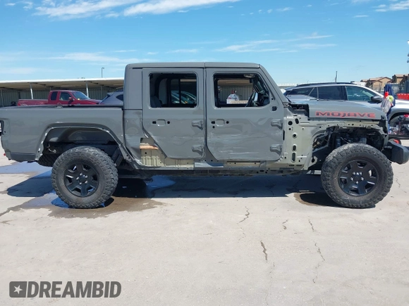 2021 Jeep Gladiator Mojave with VIN 1C6JJTEG8ML515686, listed as a IAAI auction lot 42217590 with 38,506 mi miles and . Bid and sale history available at DreamBid. Image 14.