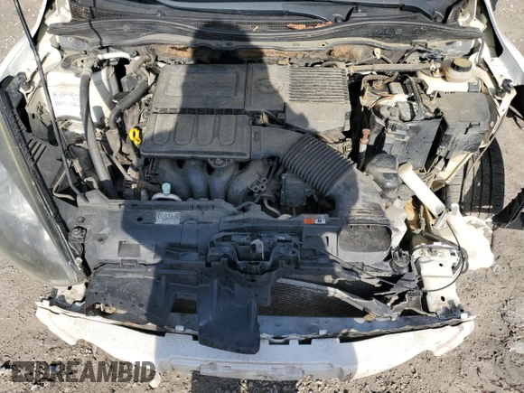 2012 Mazda 2 Sport with VIN JM1DE1KY0C0144373, listed as a Copart auction lot 44612845 with 162,823 mi miles and Salvage Title. Bid and sale history available at DreamBid. Image 11.