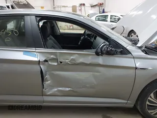 2021 Volkswagen Jetta SEL with VIN 3VWE57BUXMM056379, listed as a IAAI auction lot 42456450 with 34,697 mi miles and . Bid and sale history available at DreamBid. Image 5.