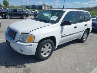 2006 GMC Envoy SLE with VIN 1GKDT13SX62258586, listed as a IAAI auction lot 42045967 with 143,225 mi miles. Bid and sale history available at carsss.com. Image 2.