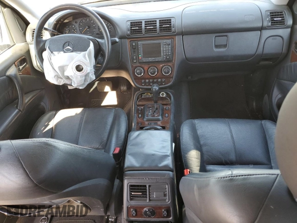 2003 Mercedes-Benz M 350 with VIN 4JGAB57E53A411711, listed as a Copart auction lot 85751154 with 114,483 mi miles and Salvage Title. Bid and sale history available at DreamBid. Image 8.