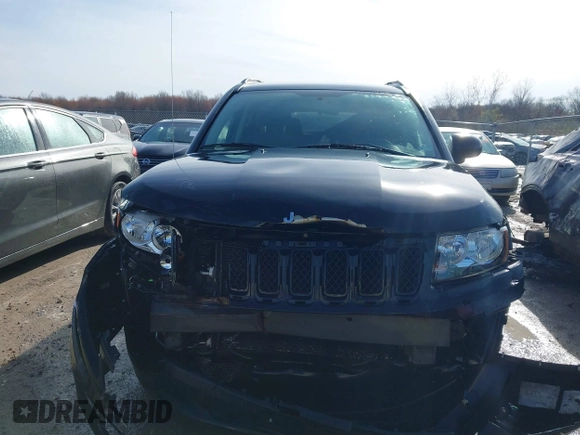 2015 Jeep Compass Sport with VIN 1C4NJDBBXFD114579, listed as a IAAI auction lot 41911501 with 95,732 mi miles and . Bid and sale history available at carsss.com. Image 12.
