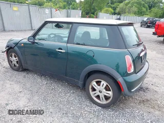2006 MINI Hardtop with VIN WMWRC33566TK64108, listed as a IAAI auction lot 42353050 with 95,223 mi miles and . Bid and sale history available at DreamBid. Image 3.