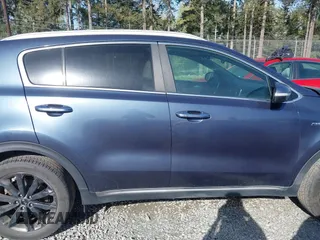 2019 Kia Sportage EX with VIN KNDPNCAC7K7615908, listed as a IAAI auction lot 42004220 with 86,654 mi miles. Bid and sale history available at carsss.com. Image 14.