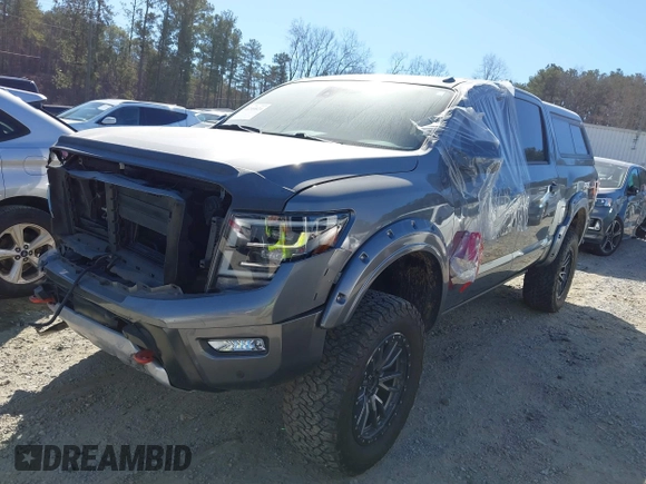 2021 Nissan Titan Pro-4X with VIN 1N6AA1ED0MN504654, listed as a IAAI auction lot 41240824 with 68,533 mi miles and . Bid and sale history available at DreamBid. Image 2.