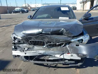 2015 BMW 5 Series 528i with VIN WBA5A5C55FD521110, listed as a IAAI auction lot 41614593 with 70,727 mi miles. Bid and sale history available at carsss.com. Image 6.