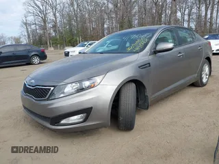 2013 Kia Optima LX with VIN 5XXGM4A79DG135066, listed as a IAAI auction lot 41915458 with 126,759 mi miles. Bid and sale history available at carsss.com. Image 2.