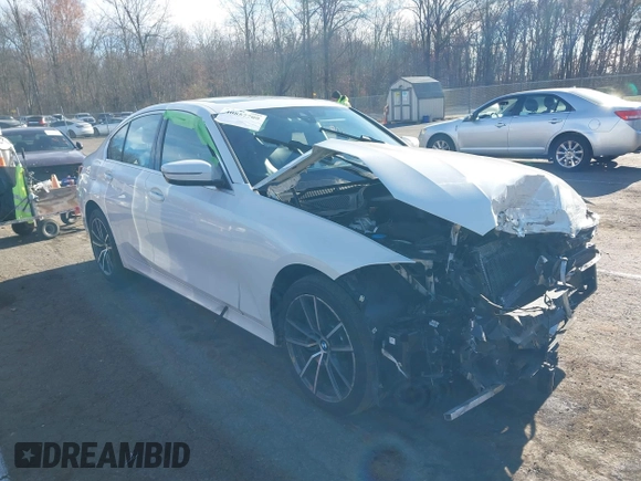 2019 BMW 3 Series 330i xDrive with VIN WBA5R7C54KAJ87250, listed as a IAAI auction lot 40857709 with 81,796 mi miles. Bid and sale history available at carsss.com. Image 1.