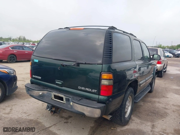 2003 Chevrolet Tahoe LT with VIN 1GNEC13Z03R268258, listed as a IAAI auction lot 41916956 with 218,720 mi miles. Bid and sale history available at carsss.com. Image 4.