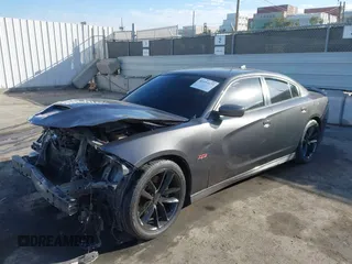 2019 Dodge Charger Scat Pack with VIN 2C3CDXGJ7KH588717, listed as a IAAI auction lot 41694673 with Not Provided miles and . Bid and sale history available at DreamBid. Image 16.