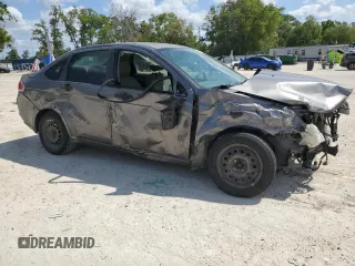 2009 Ford Focus S with VIN 1FAHP34N79W178011, listed as a Copart auction lot 51120195 with 123,930 mi miles and Salvage Title. Bid and sale history available at carsss.com. Image 4.