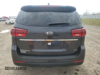 2021 Kia Sedona LX with VIN KNDMB5C17M6665266, listed as a Copart auction lot 48129495 with 57,274 mi miles and Salvage Title. Bid and sale history available at carsss.com. Image 6.