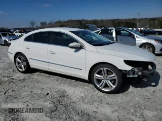 2013 Volkswagen CC Sport with VIN WVWBN7AN6DE539681, listed as a Copart auction lot 45477985 with 121,128 mi miles and Salvage Title. Bid and sale history available at DreamBid. Image 4.