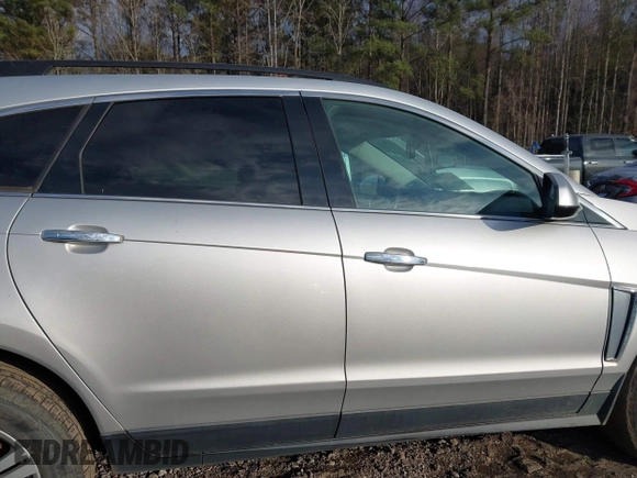 2014 Cadillac SRX with VIN 3GYFNAE39ES688059, listed as a IAAI auction lot 41408062 with 192,770 mi miles and . Bid and sale history available at DreamBid. Image 13.