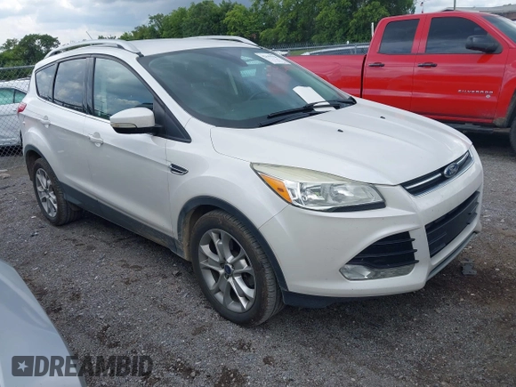 2015 Ford Escape Titanium with VIN 1FMCU0J99FUB92563, listed as a IAAI auction lot 42649556 with 183,199 mi miles and . Bid and sale history available at DreamBid. Image 1.