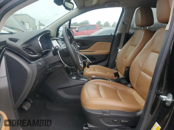 2017 Buick Encore Essence with VIN KL4CJCSBXHB099706, listed as a Copart auction lot 89332975 with 98,045 mi miles and Salvage Title. Bid and sale history available at DreamBid. Image 7.