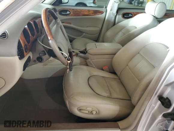 2000 Jaguar XJ with VIN SAJDA25B8YMF04079, listed as a Copart auction lot 50592595 with 131,647 mi miles and Salvage title. Bid and sale history available at DreamBid. Image 7.