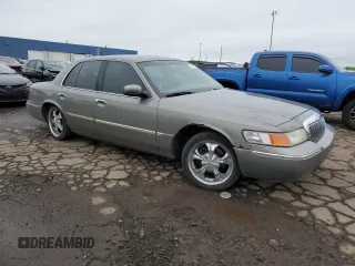 2000 Mercury Grand Marquis LS z VIN 2MEFM75WXYX742065, wystawiony jako Copart lot #57655795 z przebiegiem 175 070 mil mil oraz Tytuł czysty. Historia ofert i sprzedaży dostępna na DreamBid. Obrazek 4.