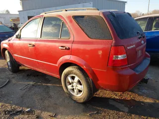 2009 Kia Sorento LX with VIN KNDJC735495868868, listed as a IAAI auction lot 41349993 with 144,935 mi miles. Bid and sale history available at carsss.com. Image 3.