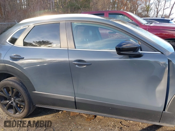 2023 Mazda CX-30 S Carbon Edition with VIN 3MVDMBCM0PM510726, listed as a IAAI auction lot 41150274 with 18,394 mi miles and . Bid and sale history available at DreamBid. Image 13.