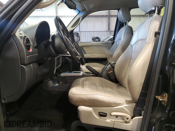2004 Jeep Liberty Limited with VIN 1J4GK58K24W325483, listed as a Copart auction lot 62526335 with 130,862 mi miles and Salvage title. Bid and sale history available at DreamBid. Image 7.