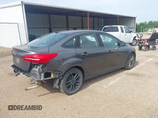 2018 Ford Focus SE with VIN 1FADP3F29JL288761, listed as a IAAI auction lot 42290510 with 93,463 mi miles and . Bid and sale history available at DreamBid. Image 4.