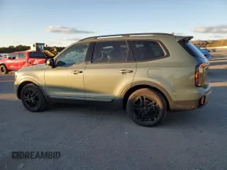 2023 Kia Telluride EX X-Line z VIN 5XYP3DGCXPG360992, wystawiony jako Copart lot #86904934 z przebiegiem 15 947 mil mil oraz Szkoda całkowita • Salvage title. Historia ofert i sprzedaży dostępna na DreamBid. Obrazek 2.