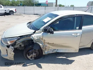 2018 Kia Rio LX with VIN 3KPA24AB2JE137858, listed as a IAAI auction lot 42016321 with 136,728 mi miles. Bid and sale history available at carsss.com. Image 6.