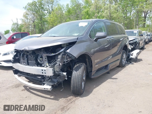 2021 Toyota Sienna XLE with VIN 5TDJRKEC3MS065212, listed as a IAAI auction lot 42086801 with 22,602 mi miles and . Bid and sale history available at DreamBid. Image 18.