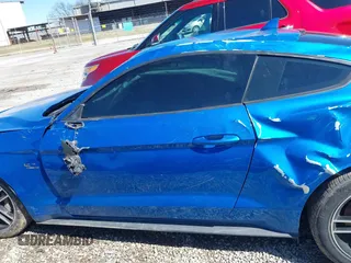 2020 Ford Mustang GT with VIN 1FA6P8CF8L5157972, listed as a IAAI auction lot 41736951 with 60,873 mi miles and . Bid and sale history available at DreamBid. Image 14.