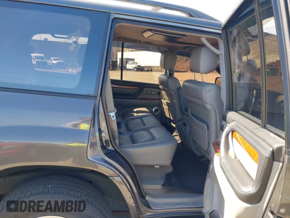 2003 Lexus LX with VIN JTJHT00W033531066, listed as a IAAI auction lot 41969617 with 209,710 mi miles. Bid and sale history available at carsss.com. Image 8.